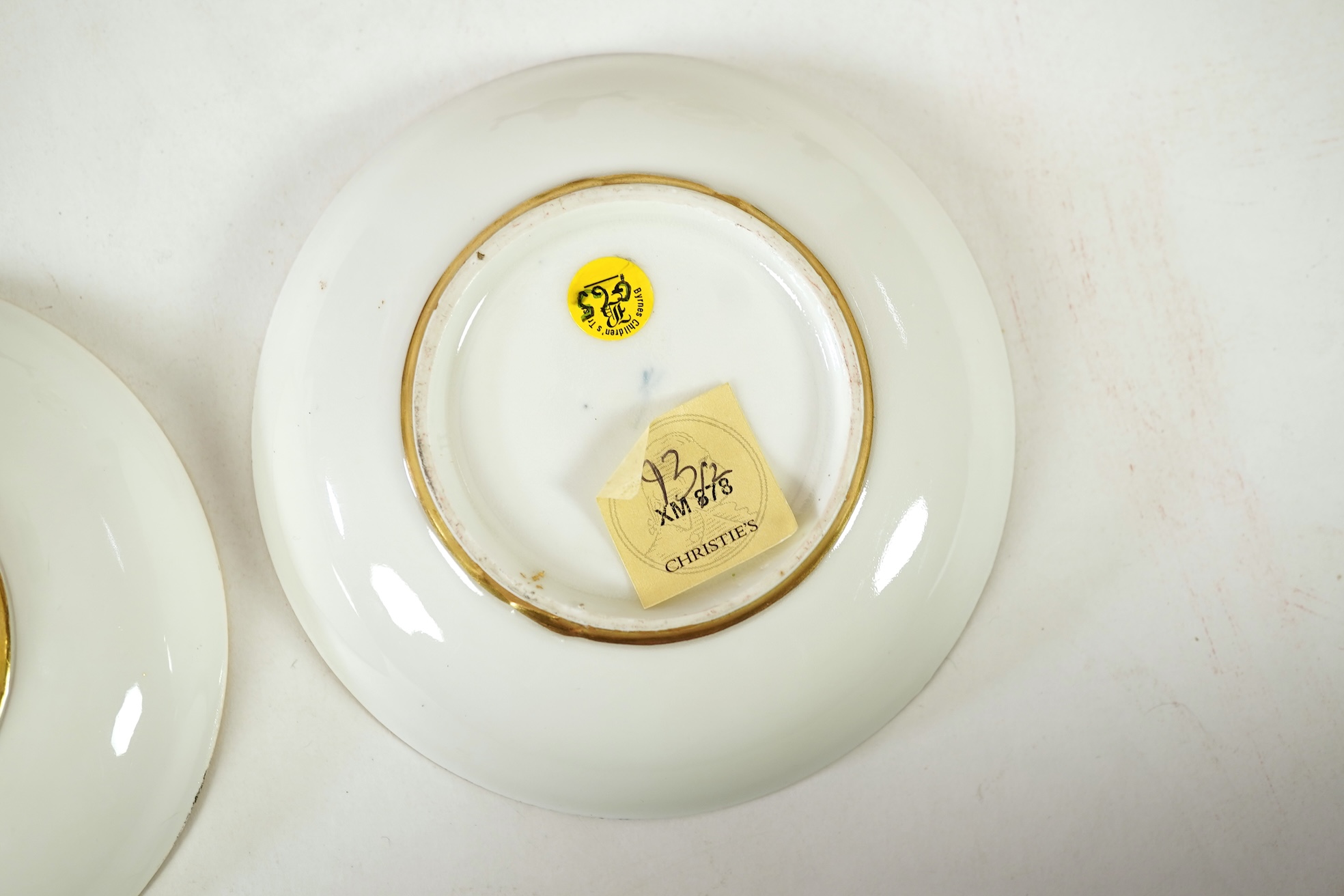 A Meissen cup and saucer, similar tea bowl and two saucers, c.1735-45